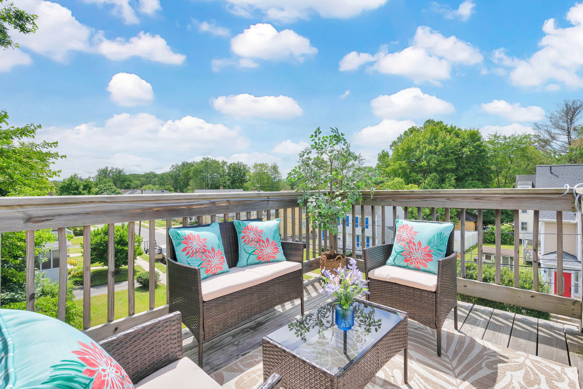 Private deck overlooking West Hartford with afternoon sky