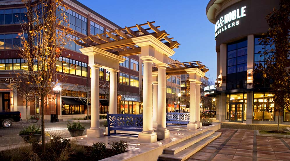 Blue Back Square at dusk — pergola, blue benches, and the Barnes & Noble
